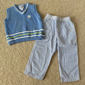 Little boy’s light blue pin stripe golf outfit